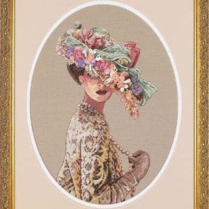 May include: A cross-stitch embroidery of a woman wearing a large, floral hat with a delicate, patterned dress. The hat is adorned with pink, white, and green flowers.