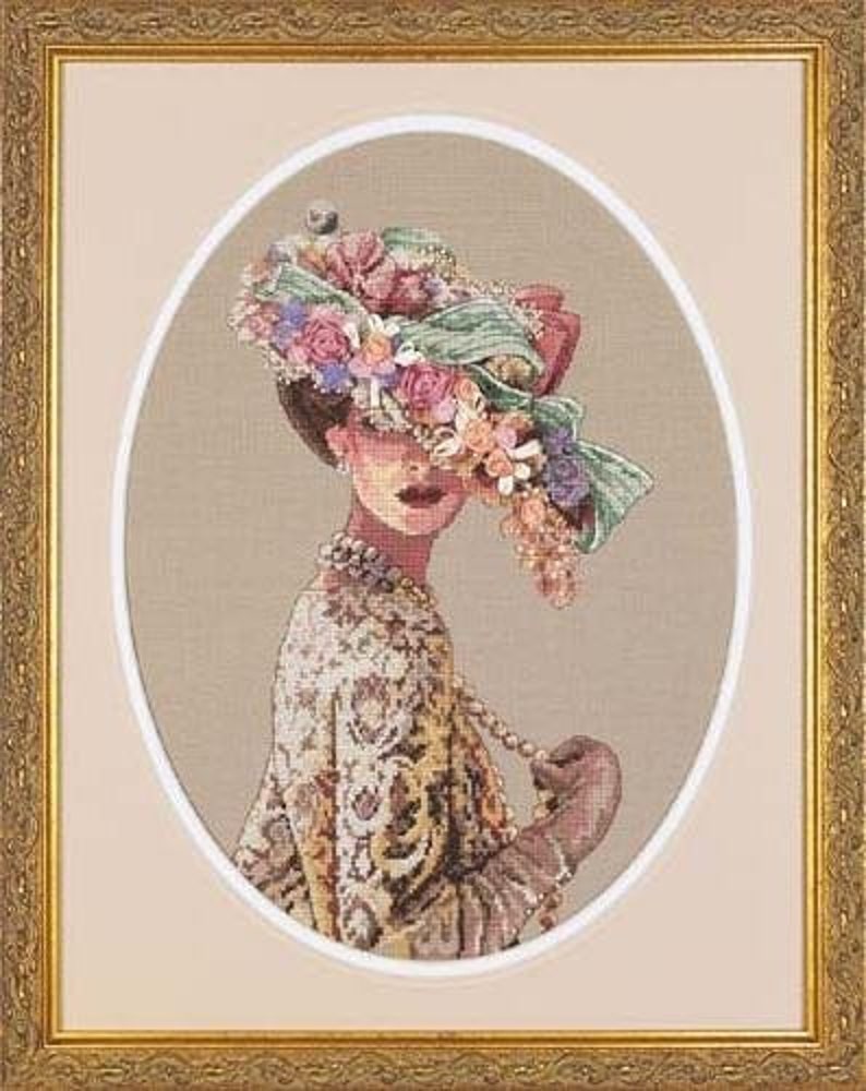 May include: A cross-stitch embroidery of a woman wearing a large, floral hat with a delicate, patterned dress. The hat is adorned with pink, white, and green flowers.