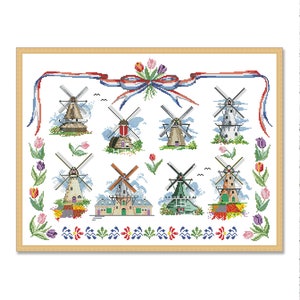 Puede incluir: Un bordado a punto de cruz enmarcado con ocho molinos de viento de varios colores y diseños, rodeados de tulipanes y una cinta roja, blanca y azul. La obra de arte está sobre un fondo blanco.