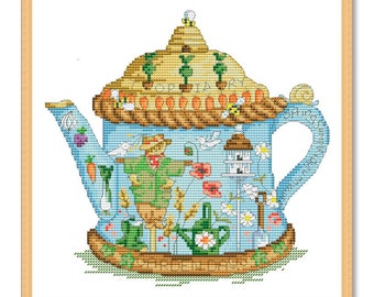 May include: A blue teapot with a whimsical garden scene. The teapot is decorated with a scarecrow, flowers, vegetables, a birdhouse, and the words "Topiary Garden Fun".