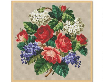Puede incluir: Un bordado de punto de cruz enmarcado que presenta un ramo de flores rojas, rosas y blancas. Las flores están dispuestas en un patrón circular e incluyen rosas, hortensias y lilas.