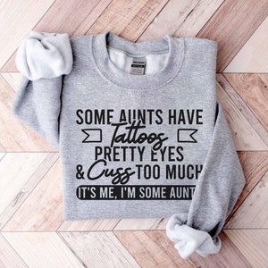Moletom para tia, Moletom "Algumas tias têm tatuagens" com olhos bonitos, Presente para tia, Camiseta para tias legais, Moletom engraçado, Camiseta de humor, Presentes para tia