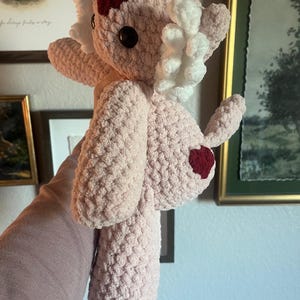 May include: A set of three ceramic mugs with a speckled, matte finish. The mugs are in shades of cream, light gray, and dark gray. Each mug has a simple, minimalist design, perfect for coffee or tea.