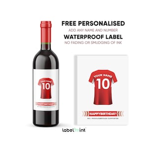 May include: Personalised wine bottle label with a red football shirt design. The label features the text "YOUR NAME" and the number "10". The label also includes the text "HAPPYBIRTHDAY" and "NO.1 MIDDLESBROUGH SUPPORTER".