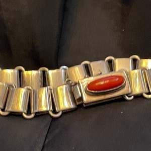 Navajo Sterling and Coral link bracelet. By P. Platero. Expertly crafted by a very accomplished silversmith. Size 7. Collectable.