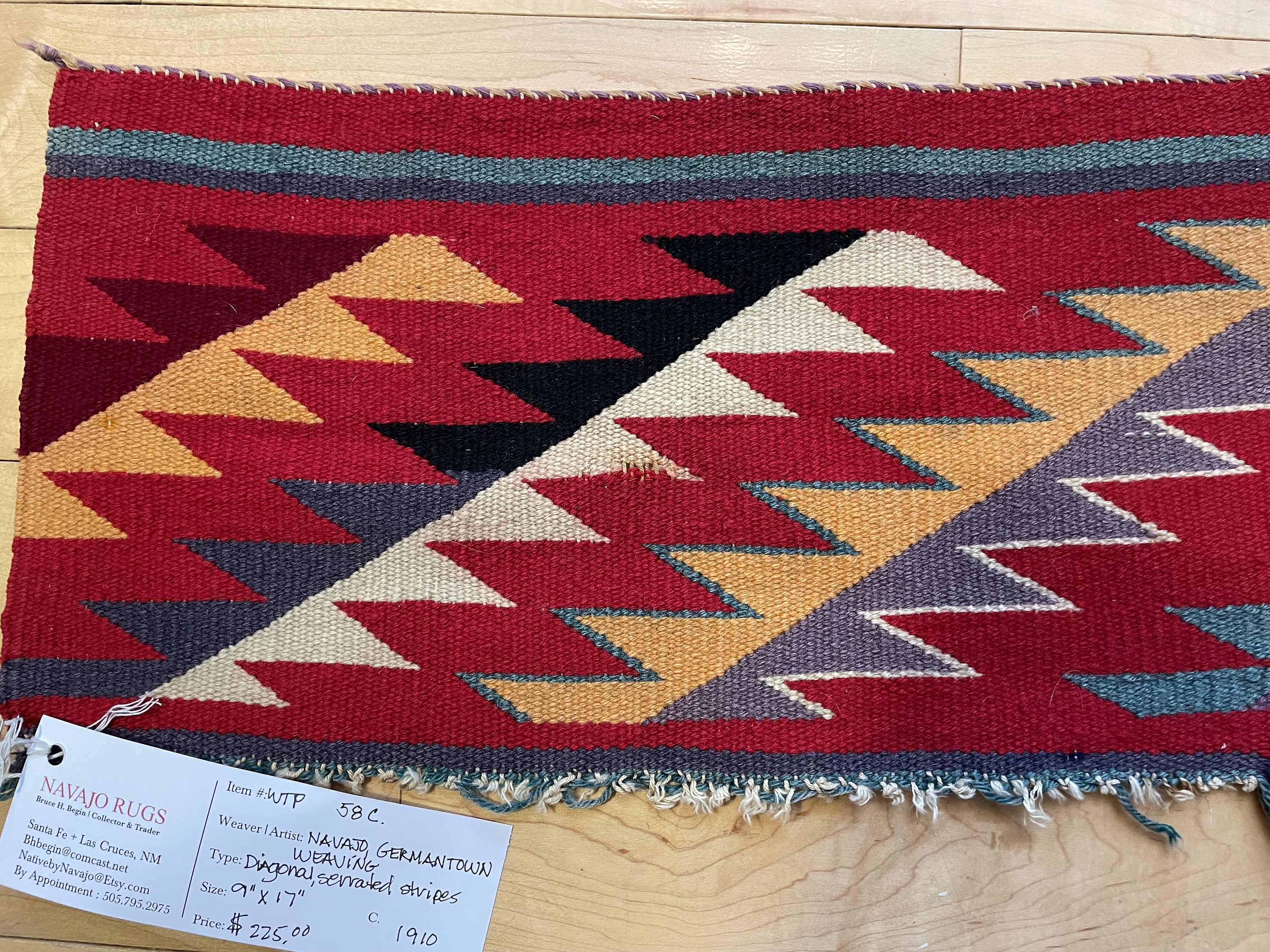 Navajo Germantown weaving, 1910. Delightful zig-zag, fantastically colorful. 9" X 17". Highly prized collectable. WTP58c