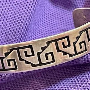 Hopi sterling silver overlay Water Wave cuff by Weaver Selina (1944-   ). Size  6- 6 1/2.