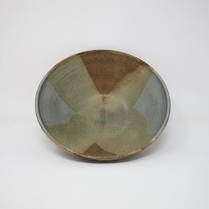 May include: A ceramic bowl with a blue, green and brown glaze. The bowl has a wide, shallow shape and a slightly flared rim.