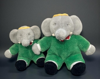 Lot of 2 BABAR Vintage Plushes- Baby and parent. By Kinder Gund 1988. Little bell inside that makes them ring. Good condition.