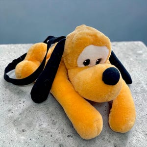 Rare to find. Cool one! Vintage PLUTO plush Disney Hand Bag. See photos and video, good condition. 15" wide.