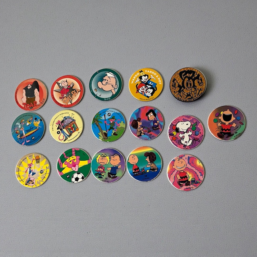 Lot of 15 Official Pogs and 1 Slammer: Peanuts, Popeye, Pink Panther ...