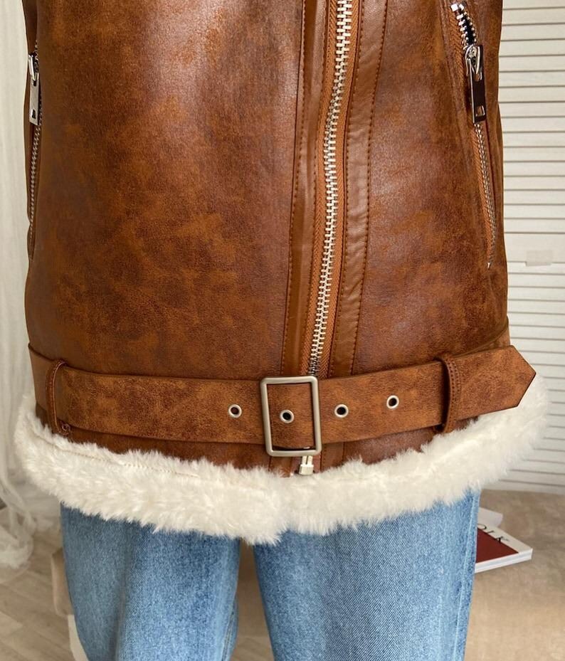 B3 bomber jacket women, RAF lambskin aviator coat, vintage brown shearling outerwear, real leather winter bomber, distressed flight jacket women, fur collar and cuff jacket, WWII pilot bomber coat, warm sheepskin flight jacket, retro aviator winter wear, classic fur-lined bomber, women’s brown leather coat, soft lambskin shearling jacket, stylish pilot bomber outerwear, handmade winter flight jacket, brown shearling coat for women, cozy RAF bomber jacket, women’s lambskin fur coat