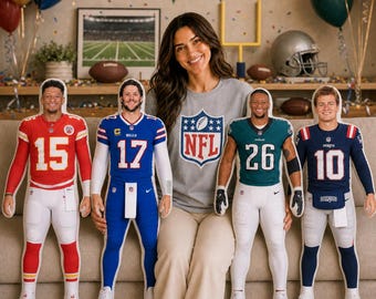 May include: Four custom-shaped plush pillows featuring NFL football players in their respective team uniforms, including red, blue, green, and navy jerseys with numbers 15, 17, 26, and 10, displayed on a sofa alongside a person wearing a grey NFL shirt.
