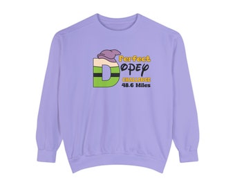 May include: Purple long-sleeved sweatshirt with a green "D" and the text "Perfect Dopey Challenge 48.6 Miles".