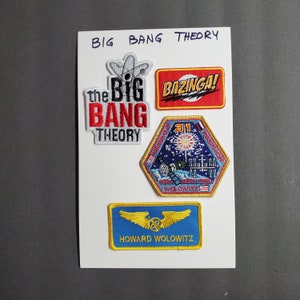 May include: A selection of embroidered patches with designs and text from the TV show "The Big Bang Theory." Patches include the show's logo, the word "Bazinga!", and a patch with the name "Howard Wolowitz."