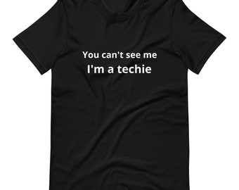 May include: Black t-shirt with white text that reads "You can't see me I'm a techie".