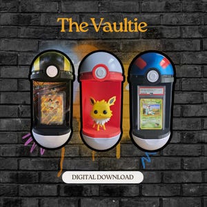 May include: Three display cases, each with a different design, are arranged against a brick wall. The cases are black, red, and blue, and each contains a collectible item, including a card and a figurine. The text "The Vaultie" is at the top, and "DIGITAL DOWNLOAD" is at the bottom.