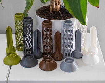 May include: A collection of 10 different colored plastic plant supports for climbing plants. The supports are made of a lattice design and come in green, gray, brown, and white.