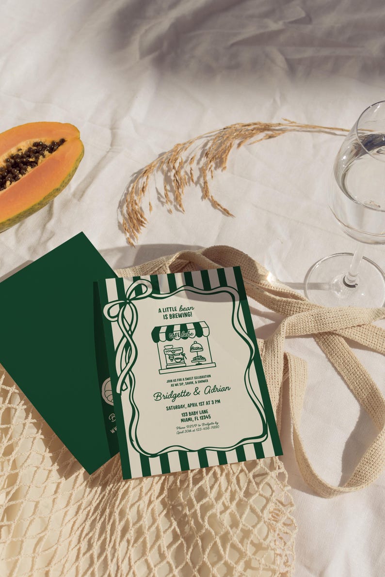 May include: A baby shower invitation with a green and white striped border and the text "A Little Bean is Brewing!". The invitation includes the names Bridgette & Adrian, date, time, and address. A slice of papaya and a glass of water are also visible.