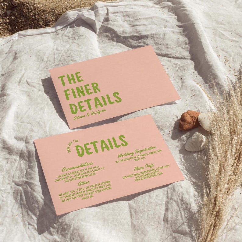 May include: Pink wedding invitation cards with green text. The top card says "The Finer Details" and the bottom card says "Here Are The Details" with information about accommodations, attire, wedding registration, and more info.