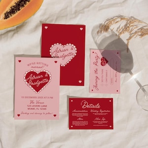 May include: Pink and red wedding invitation cards with a heart design and the text "We're getting married! Adrian & Bridgette" and "Joining the Party?" with details about the wedding date, time, and location.
