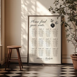 May include: A black and white wedding seating chart with a dice design. The chart lists the names of guests assigned to each table. The text reads "Please find your seats." and "Adrian + Bridgette 12.15.20XX".