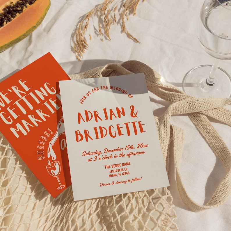 May include: Wedding invitation with the names Adrian & Bridgette in orange script. The invitation includes the date, time, and venue details. A second card reads "We're getting married! Cheers!" in white text on an orange background.