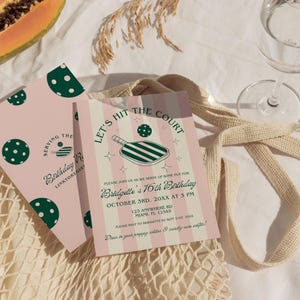 May include: Pink and white striped invitation with a green and white paddleball illustration. The text reads "Let's Hit the Court" and "Bridgette's 16th Birthday".