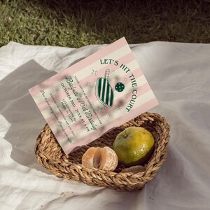 May include: A pink and white striped invitation with the text "Let's Hit the Court" and "Bridgette's 16th Birthday". The invitation features a green and white illustration of a paddleball paddle and ball.
