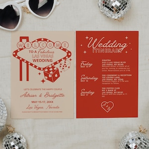 May include: A red and white wedding invitation with a Las Vegas theme. The invitation features a neon sign that says "Welcome to a Fabulous Las Vegas Wedding". The invitation also includes the names of the couple, the wedding date, and the wedding location. The back of the invitation includes a wedding itinerary with details about the wedding weekend.
