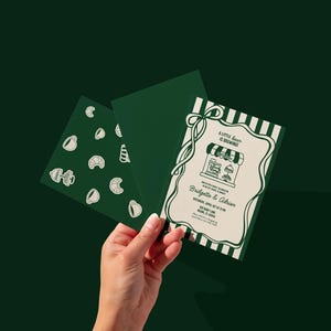 May include: Green and white invitation with the text "A little bean is brewing" and the names Bridgette & Adrian. The invitation has a striped border and a drawing of a coffee shop. Two additional green cards are also visible.