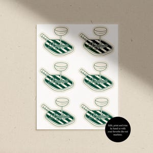 May include: Sheet of stickers featuring a paddle with a wine glass and the word "Bridgelle" in a script font. The paddle has green and white stripes. The stickers are on a white background. Text on the image says "Edit, print and trim by hand or with your favorite die-cut machine."