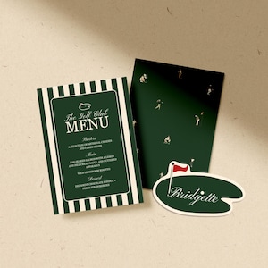 May include: A menu and name card set for The Golf Club. The menu features a dark green background with white stripes and text. The name card is a green oval with a golf flag and the name "Bridgette".