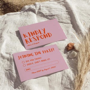 May include: Two pink party invitation cards with orange text. The top card reads "KINDLY RESPOND" and the bottom card says "JOINING THE PARTY?" with RSVP details. The cards are on a white cloth with beach elements.