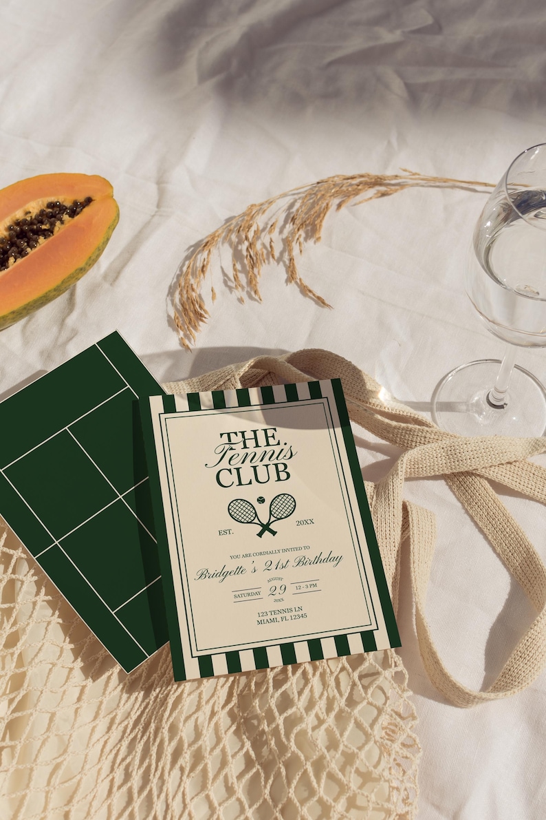 May include: A tennis-themed invitation with the text "The Tennis Club" and a tennis court graphic. The invitation is cream-colored with dark green accents and includes event details. A slice of papaya and a glass of water are also present.