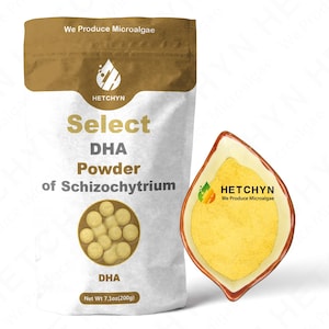 May include: A white bag of Select DHA Powder of Schizochytrium with a brown top, and a leaf-shaped dish filled with yellow powder. The bag has the text "HETCHYN We Produce Microalgae" and "Net Wt 7.1oz(200g)".