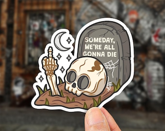 May include: A die-cut sticker featuring a beige human skull and a skeletal hand emerging from brown soil, giving the middle finger. Behind them is a grey tombstone with the text SOMEDAY, WE'RE ALL GONNA DIE, a white crescent moon, and stars.
