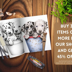 May include: A coloring book open to a page with a black and white illustration of three dalmatian puppies in a bucket. The text on the page reads "BUY 3 ITEMS OR MORE IN OUR SHOP AND GET 45% OFF automatically applied at checkout".