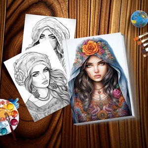 May include: A coloring book page featuring a woman with long dark hair wearing a blue headscarf with floral embroidery. The woman has a flower in her hair and is looking at the viewer. The page is surrounded by paintbrushes, a paint palette, and a globe.