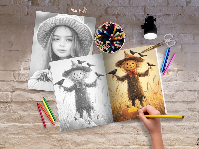 May include: A coloring book open to a page with a black and white illustration of a scarecrow with crows. The scarecrow is wearing a hat and has a long, flowing beard. The page is surrounded by a variety of colored pencils and a small lamp.
