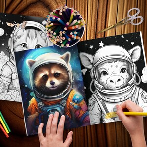 May include: Colouring books with animal astronauts. One book shows a raccoon in an orange spacesuit, another a cow, and a third a cat. A child is colouring the cow astronaut with a yellow pencil. Coloured pencils and scissors are also on the wooden surface.