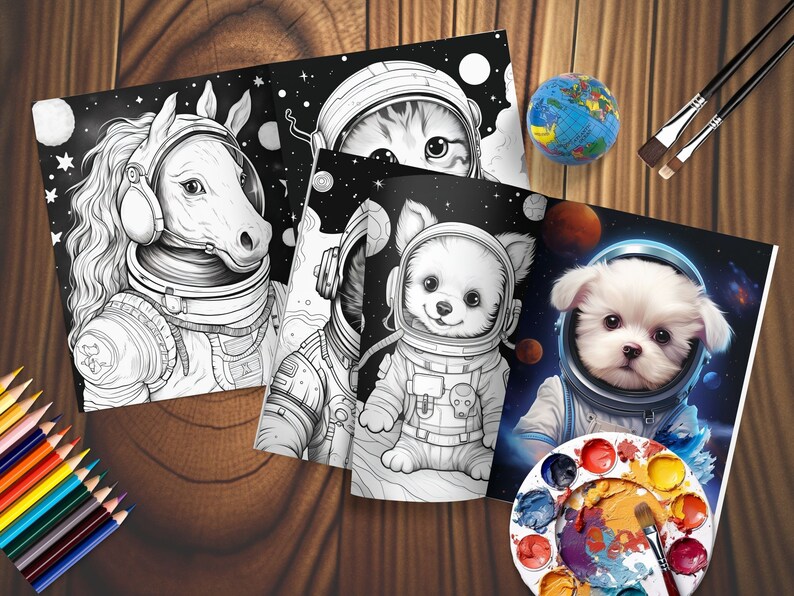 May include: A set of colouring pages depicting animals in space suits, set against a starry backdrop. The pages show a horse, a cat, and two dogs. A globe, paint palette, paintbrushes, and coloured pencils are also present.
