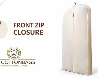 May include: A cream-colored garment bag featuring a vertical front zip closure. The image includes a circular icon of a zipper, the text FRONT ZIP CLOSURE, and the logo for MYCOTTONBAGS with the tagline Innovate. Create. Elevate.