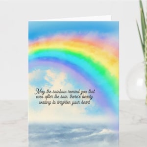 Handgemaakte wenskaarten met regenboog boven water tafereel
