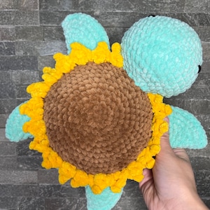 Stuffed turtle. Handmade crochet amigurumi Turquoise tournesol