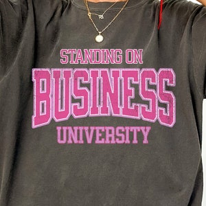Unique Standing on Business PNG,university shirt design,Quirky designs,Hilarious graphics,Clever illustrations,varsity png,Entertaining.
