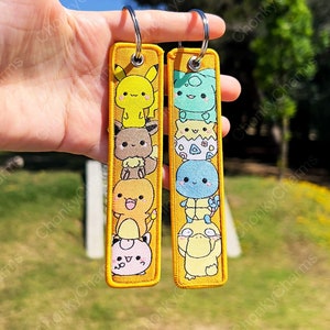 Dubbelzijdig geborduurde anime-sleutelhanger / sleutelhanger / Jet Tag