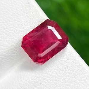 May include: A set of three ceramic mugs with a speckled, matte finish. The mugs are in shades of cream, light gray, and dark gray. Each mug has a simple, minimalist design, perfect for coffee or tea.