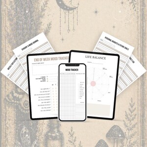 May include: A digital mood tracker and life balance planner displayed on a smartphone and tablet screen, surrounded by printable journal pages. The text reads GENTLE SUPPORT FOR ENERGY & REST and Includes Printable Journal with white text on purple.