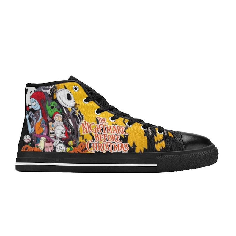 May include: High-top canvas sneaker featuring characters from "The Nightmare Before Christmas" on a yellow and black background. The shoe has a black toe cap, laces, and sole, with the movie title printed on the side.